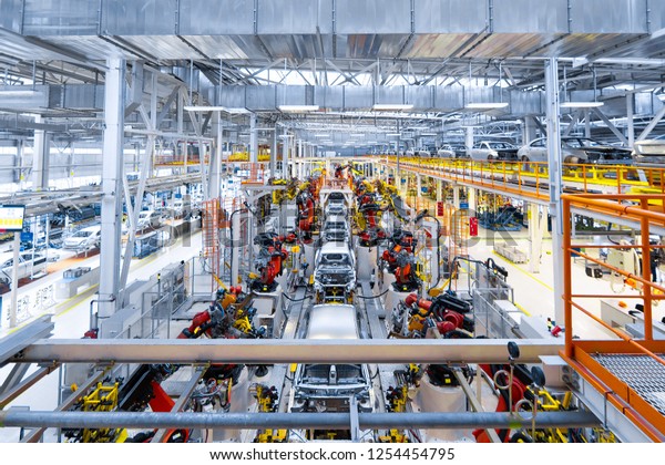Automotive production line. Welding car body.
Modern car Assembly
plant