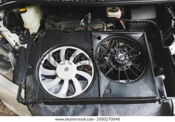 Automotive Radiator Cooling fan and motor in\
garage services.