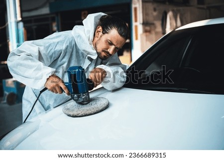 Automotive repair shop, concept of car detailing and polishing by professional car service worker with precision using orbital polisher machine creative captivating automotive flourish . Oxus