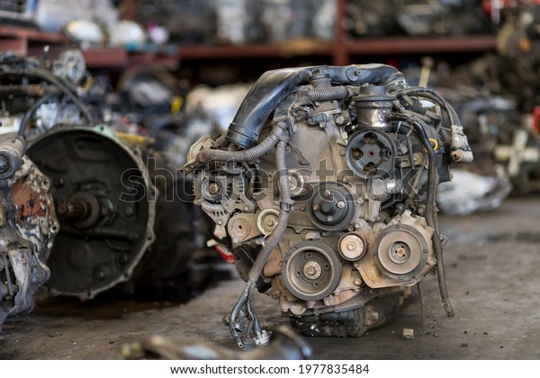 Automotive spare parts, engine at the storage\
warehouse or garage