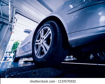 Automotive Suspension Test And Brake Test Rolls In A Auto Repair Service. Background