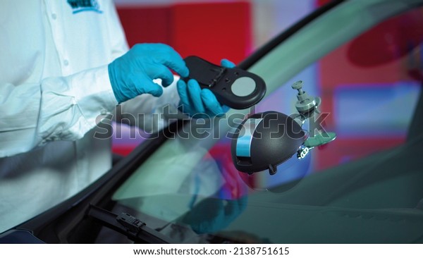 Automotive\
windshield repair tool. Car glass crack\
repair