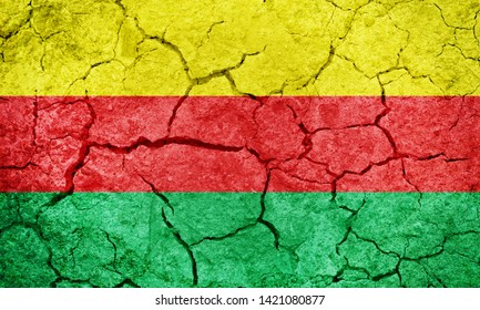 Autonomous Administration Of North And East Syria, Rojava Flag On Dry Earth Ground Texture Background