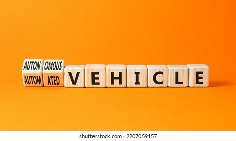 Autonomous Or Automated Vehicle Symbol. Turned Wooden Cubes And Changed Words Automated Vehicle To Autonomous Vehicle. Orange Background. Business Autonomous Or Automated Vehicle Concept, Copy Space.