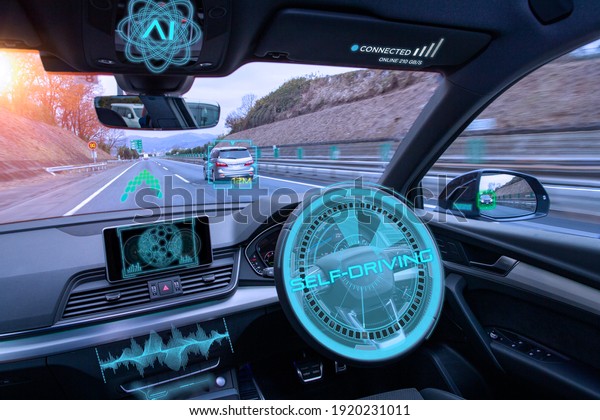 Autonomous cars on a road with visible connection. 5G\
network connection. Interior of an autonomous car. Driverless\
vehicle. 