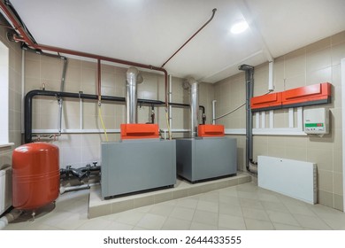 Autonomous heating system in the basement of a private house. Special modern equipment in the boiler room interior.