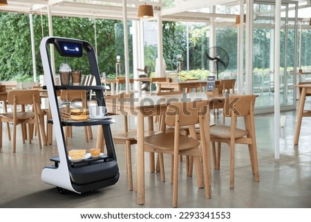 Autonomous waiter robot working in restaurant, Artificial intelligence 5G technology concept