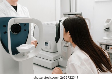 Autorefractor measures refractive errors, helping determine prescriptions for glasses or contact lenses with high accuracy and efficiency. Eye exam with modern autorefractor and OCT machines