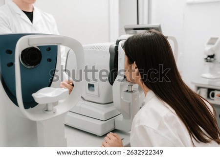 Autorefractor measures refractive errors, helping determine prescriptions for glasses or contact lenses with high accuracy and efficiency. Eye exam with modern autorefractor and OCT machines