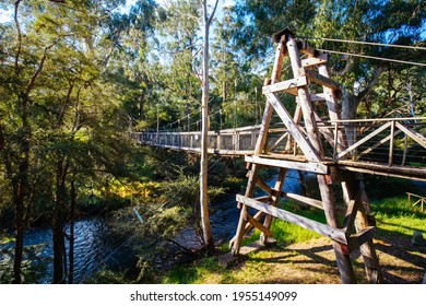 Autumn Afternoon Light Is Cast Over The Yarra River On The Yarra River Walk Trail At The Warburton Redwood Suspension Bridge In Warburton, Victoria,. Australia