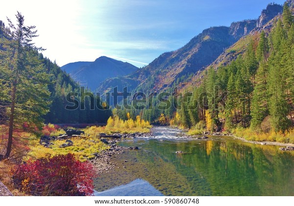 Cascade Mountains Rise Above The Wenatchee River On A Clear Day Near