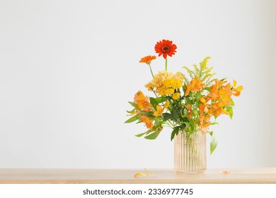 autumn bouquet on wooden shelf on background gray wall - Powered by Shutterstock