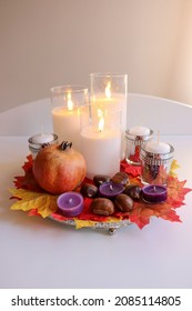 Autumn Centerpiece With Pomegranate And Candles