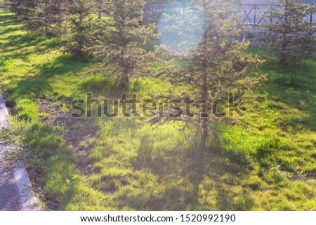 Similar – View through the reflective pane over a terrace onto the coast of Western Canada