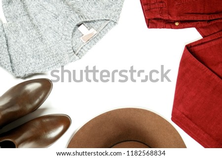 Autumn clothing essentials ideas for fashion blog look book showcase. Casual set of matching garment items. Trendy mass market apparel concept. Background, copy space, close up, top view, flat lay.
