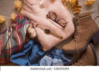 Autumn Clothing Outfit With Sweater, Jeans And Boots, Top View Of Fall/winter Season Outfit Idea With Glasses And Watch Accessory