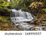 Autumn colors at Wagner Falls. waterfall in Michigan