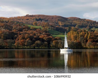 Autumn Colours And Yacht On Lake Windermere, Lake District, England