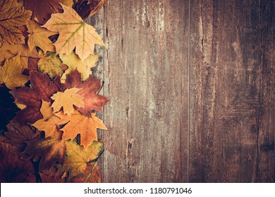 Autumn Composition. Frame Made Of Autumn Dried Leaves On Dark Wooden Vintage Background. Autumn, Fall, Background. Flat Lay, Top View, Copy Space