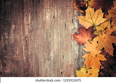 Autumn Composition. Frame Made Of Autumn Dried Leaves On Dark Wooden Vintage Background. Autumn, Fall, Background. Flat Lay, Top View, Copy Space 