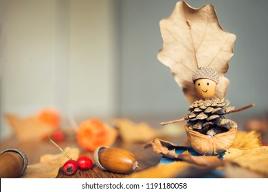 Autumn Craft With Kids. Children's Cute Boat With Man Made Of Natural Materials.