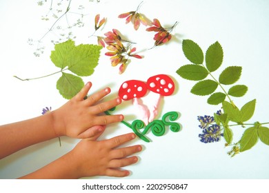 Autumn Crafts. Child Making Crafts From Natural Dry Plants, Flowers, Grass And Leaves Use  Plasticine. Back To School, Natural History. Ideas For Children's Art