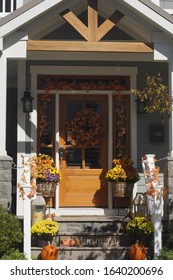 Autumn Decorated Wooden Porch Steps And Door With Flowers, Pumpkins