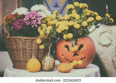 Autumn Decoration With Pumpkins And Flowers On A Street In A European City. Harvest Of Pumpkin.