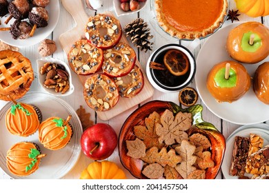 Autumn Desserts Table Scene With Various Sweet Fall Treats. Top View Over A White Wood Background.