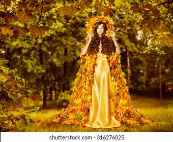 Autumn Fairy Woman In Forest, Nymph In Yellow Leaves Dress, Fantasy Goddess Of Earth