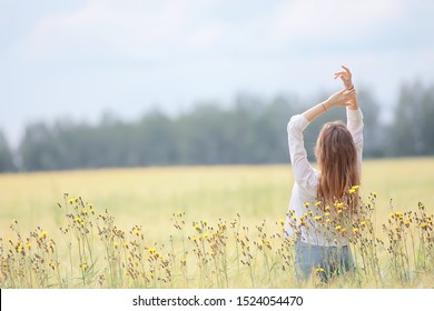 autumn field girl health / beautiful young model, landscape in a summer field, cute happy model