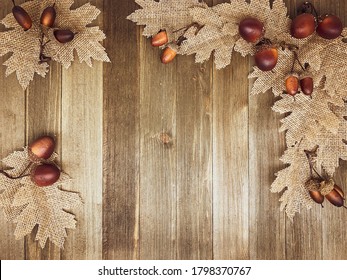 Autumn Flat Lay, Burlap And Wood Texture Fall Leaves And Acorns