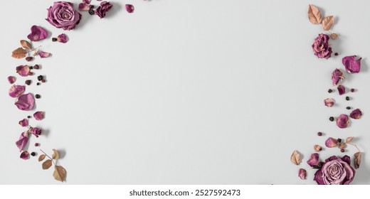 Autumn floral background with dry roses. Frame made from beautiful dried roses on a gray background. Top view, flat lay. - Powered by Shutterstock