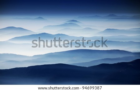 Autumn foggy landscape in Parang Mountains, Romania, Europe