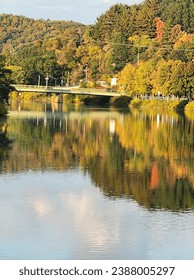 autumn foliage reflecting in susquehanna river