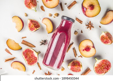 Autumn Fruit Red Smoothie In Small Portioned Bottle. Figs And Plums Smoothie, With Autumn Traditional Spices, Flatlay On White Background 