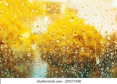 Autumn glass window with raindrops, background - Powered by Shutterstock