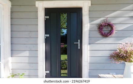 Autumn Heather Wreath Decorating Front Door. Autumn Fall Concept