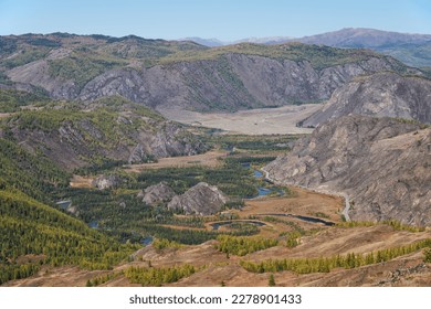 Autumn highland landscape. Altai river Chuya surrounded by mountains. Larch trees in yellow autumn color. Altai, Siberia, Russia. - Shutterstock ID 2278901433
