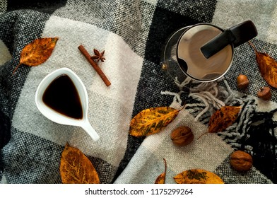 Autumn Home Decor. Metal Coffee Pot And Vintage White Ceramic Coffee Cup, Cinnamon Sticks, Anise Stars And Honey In Honeycombs On Checkered Plaid,  Top Vie. Hygge Style, Concept Of Comfort 