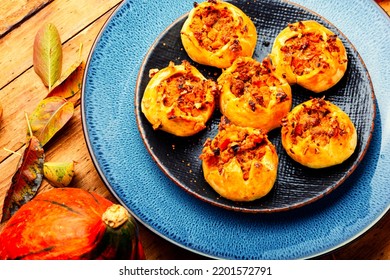 Autumn homemade pastries.Fresh buns with minced meat and pumpkin. - Shutterstock ID 2201572791