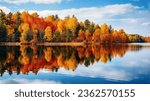 autumn lake landscape with reflection,clouds