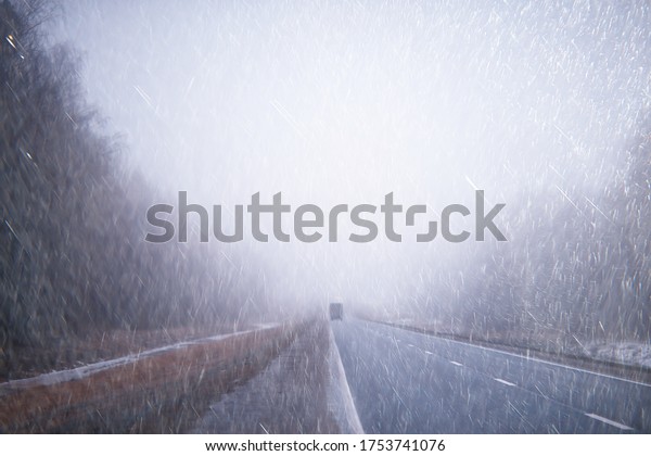 autumn landscape highway rain and fog in europe,\
dangerous road, bad\
weather