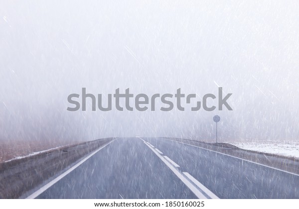 autumn landscape highway rain and fog in europe,
dangerous road, bad
weather