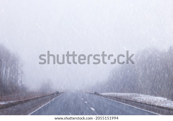 autumn landscape highway rain and fog in europe,\
dangerous road, bad\
weather