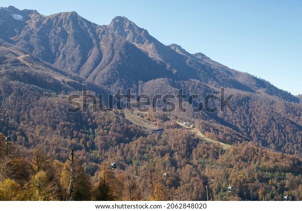 Autumn\
landscapes in the mountains with ski infrastructure. Funicular,\
cable car. Sochi, Krasnaya Polyana,\
Russia.