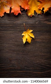 Autumn Leaf On Wood Black Background (top View) Orange Leaf On Old Grunge Wood Deck, Copy Place For Inscription, Tablet For Text,