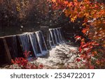 Autumn leaves offer a splash of color at DeSoto Falls, Nov. 4, 2017 in Mentone, Ala. The area features a 104-foot waterfall and is part of DeSoto State Park.