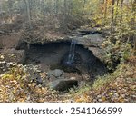 Autumn leaves and trees with small waterfall Ohio parks Blue Hen Falls