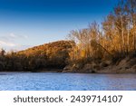 Autumn of Meramec River, colorful mountain under the blue sky